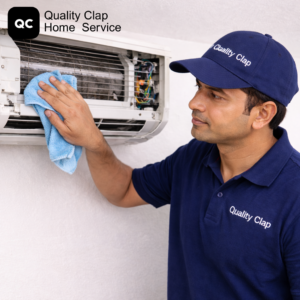Professional technician cleaning AC indoor unit to improve cooling performance and air quality