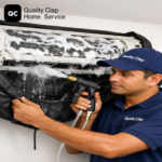 Technician servicing air conditioner at home - Quality Clap AC repair service
