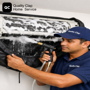 Technician servicing air conditioner at home - Quality Clap AC repair service